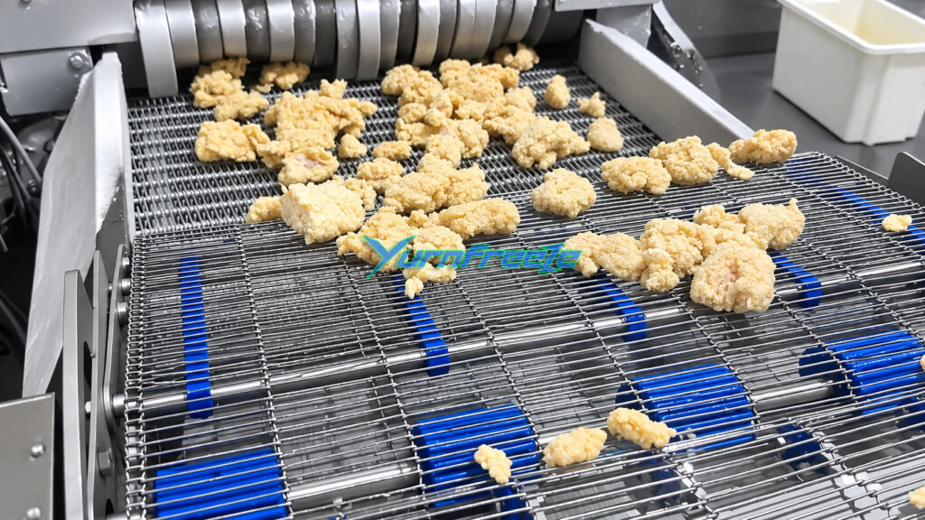 Spiral Freezer Frozen fried chicken pieces inlet
